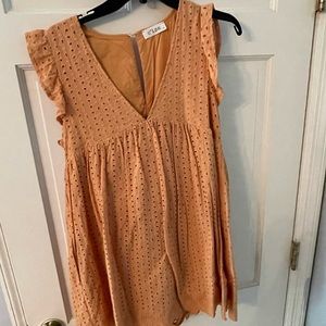 mustard eyelet dress with shorts underneath